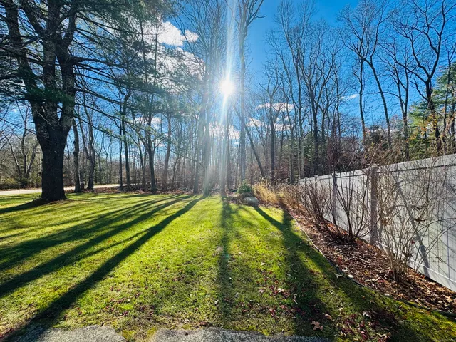 a swimming pool with wooden fence