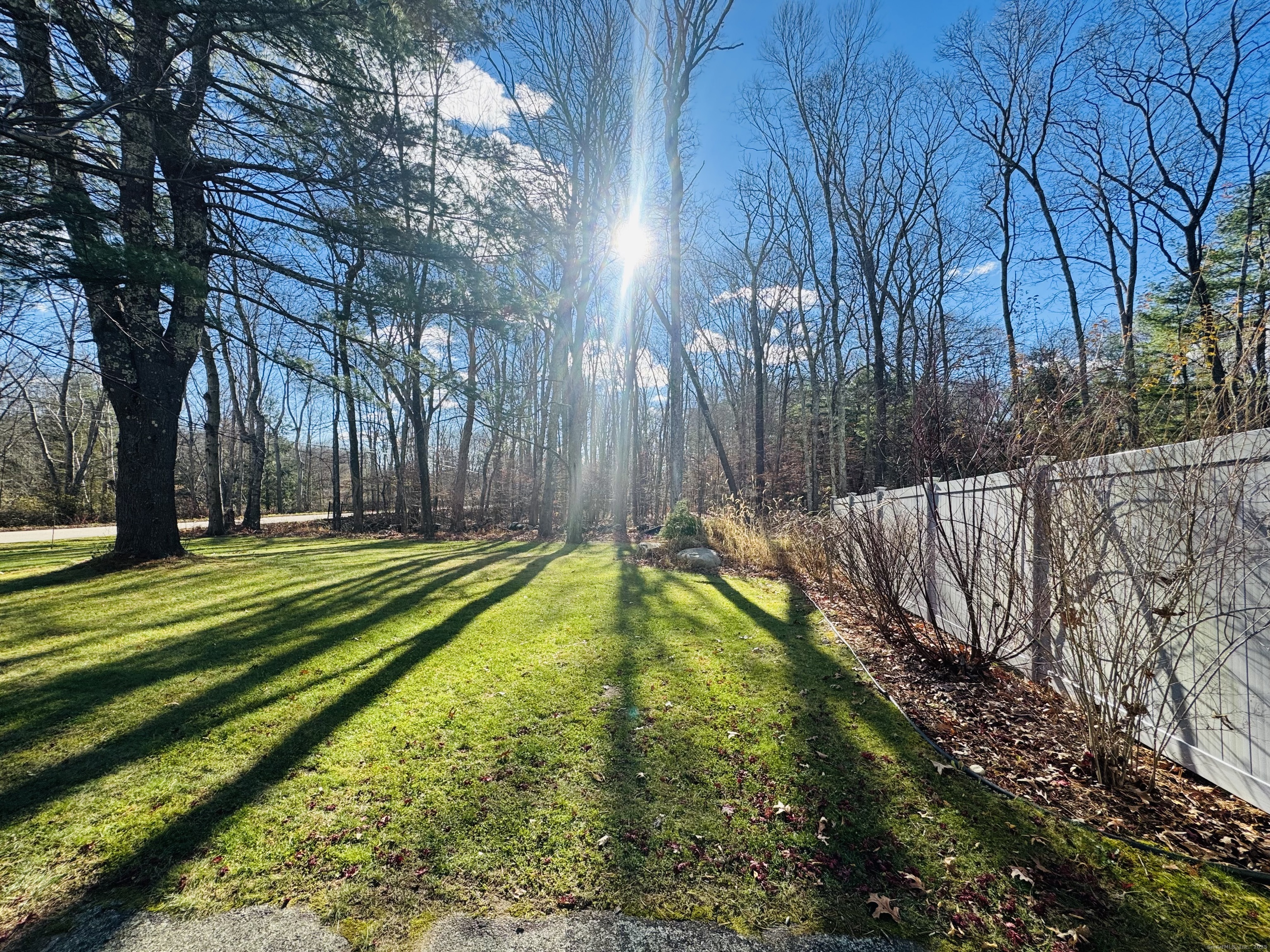 205 Ballamahack Road Windham, CT 06280 - Photo 9 of 29 a swimming pool with wooden fence