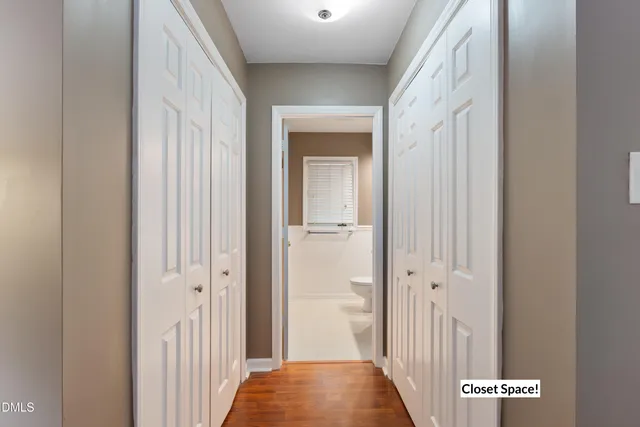 a bathroom with a sink toilet and mirror