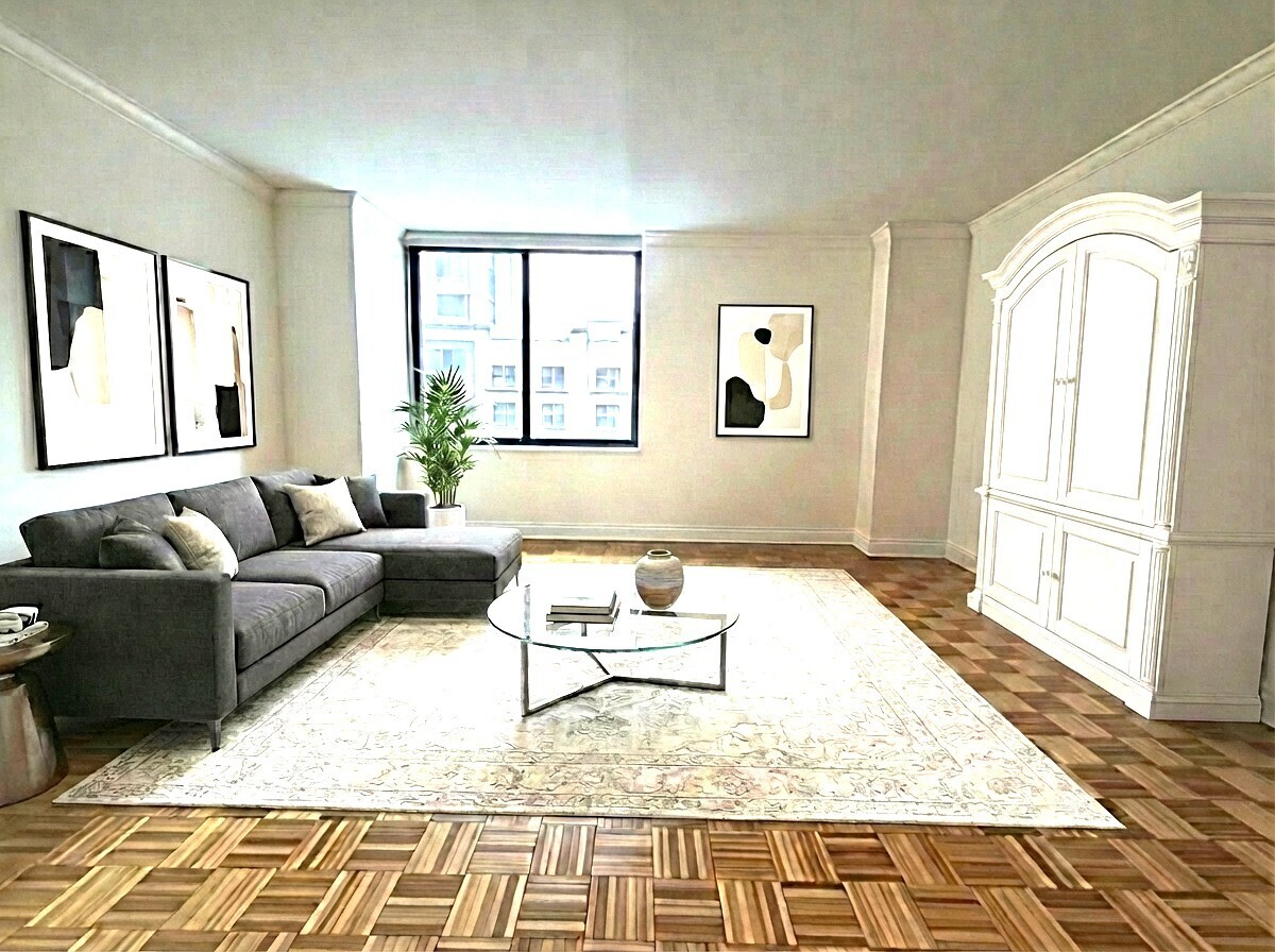 a living room with furniture and a rug