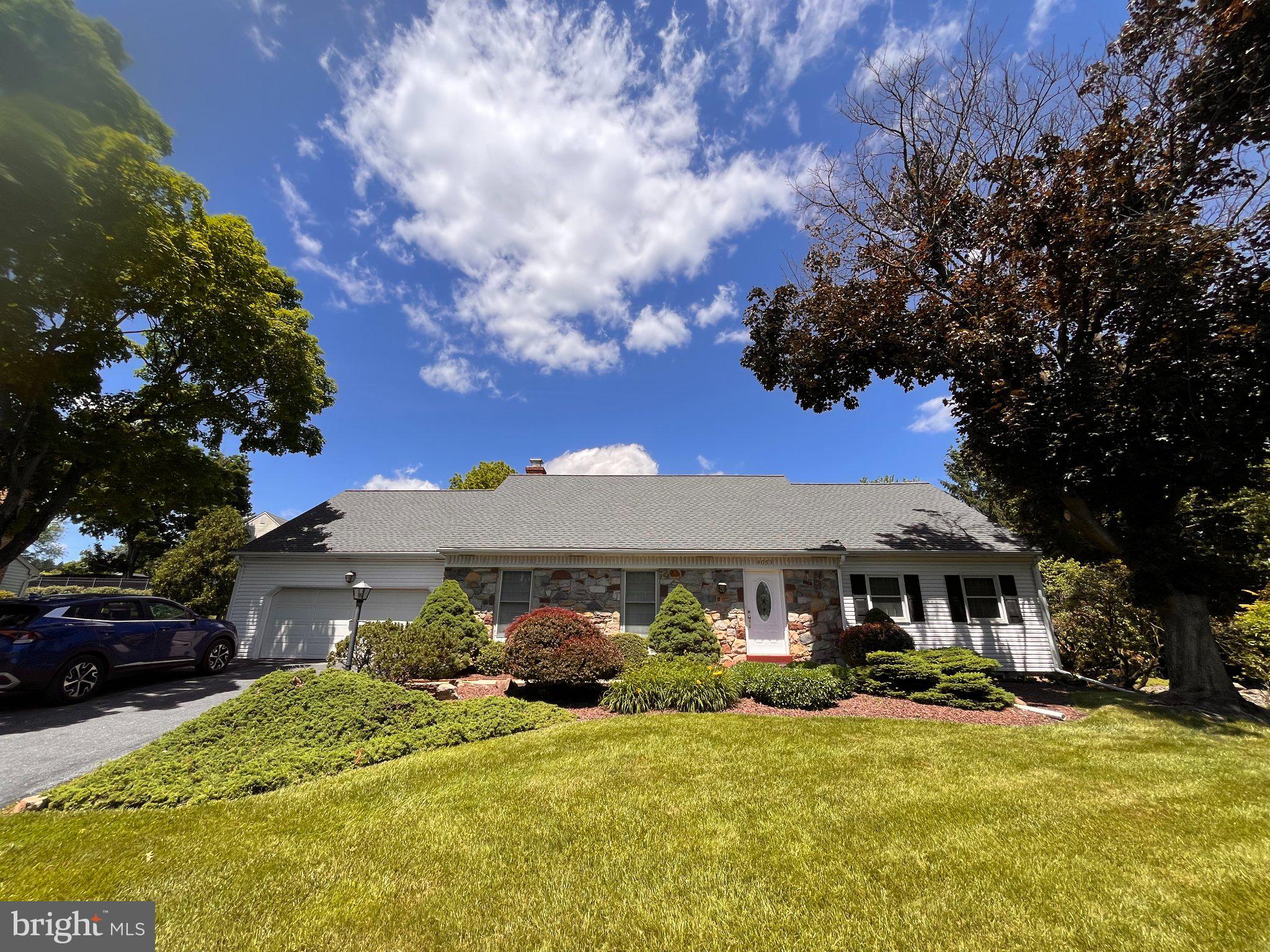 4053 Wedgewood Road Allentown, PA 18104 - Photo 1 of 8 Charming home under a bright sky.
