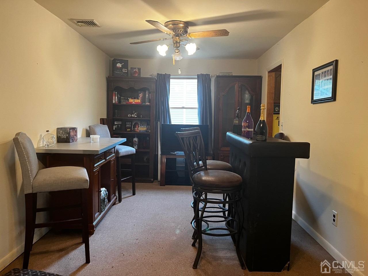 180 Amboy Road Old Bridge, NJ 07747 - Photo 16 of 29 a dining room with furniture and window