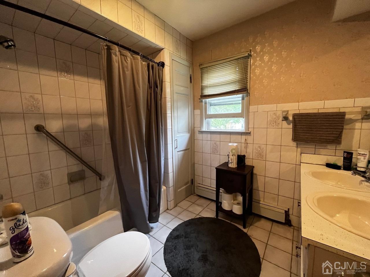 180 Amboy Road Old Bridge, NJ 07747 - Photo 20 of 29 a bathroom with a sink toilet and shower