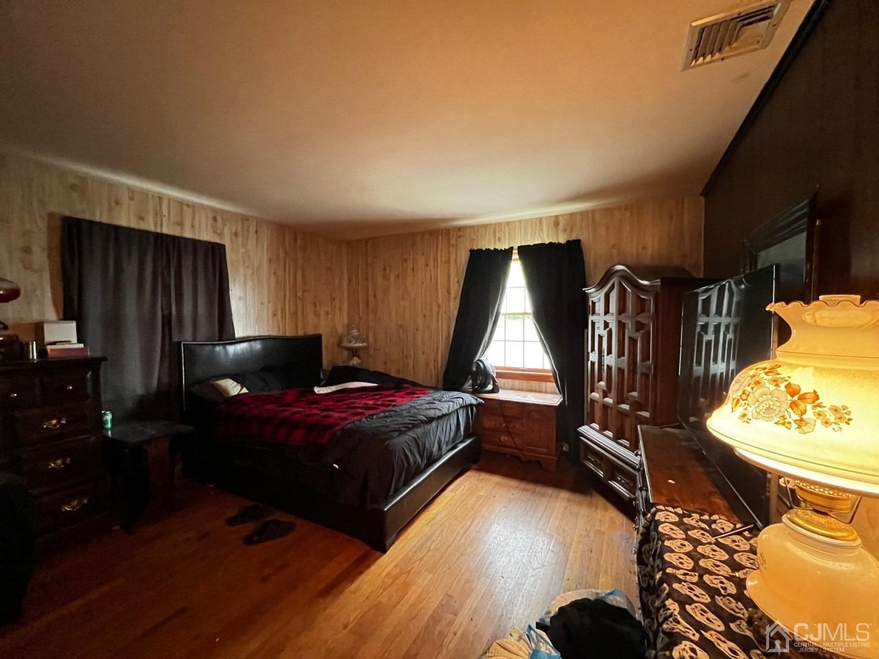 180 Amboy Road Old Bridge, NJ 07747 - Photo 24 of 29 a bed room with a bed and a window