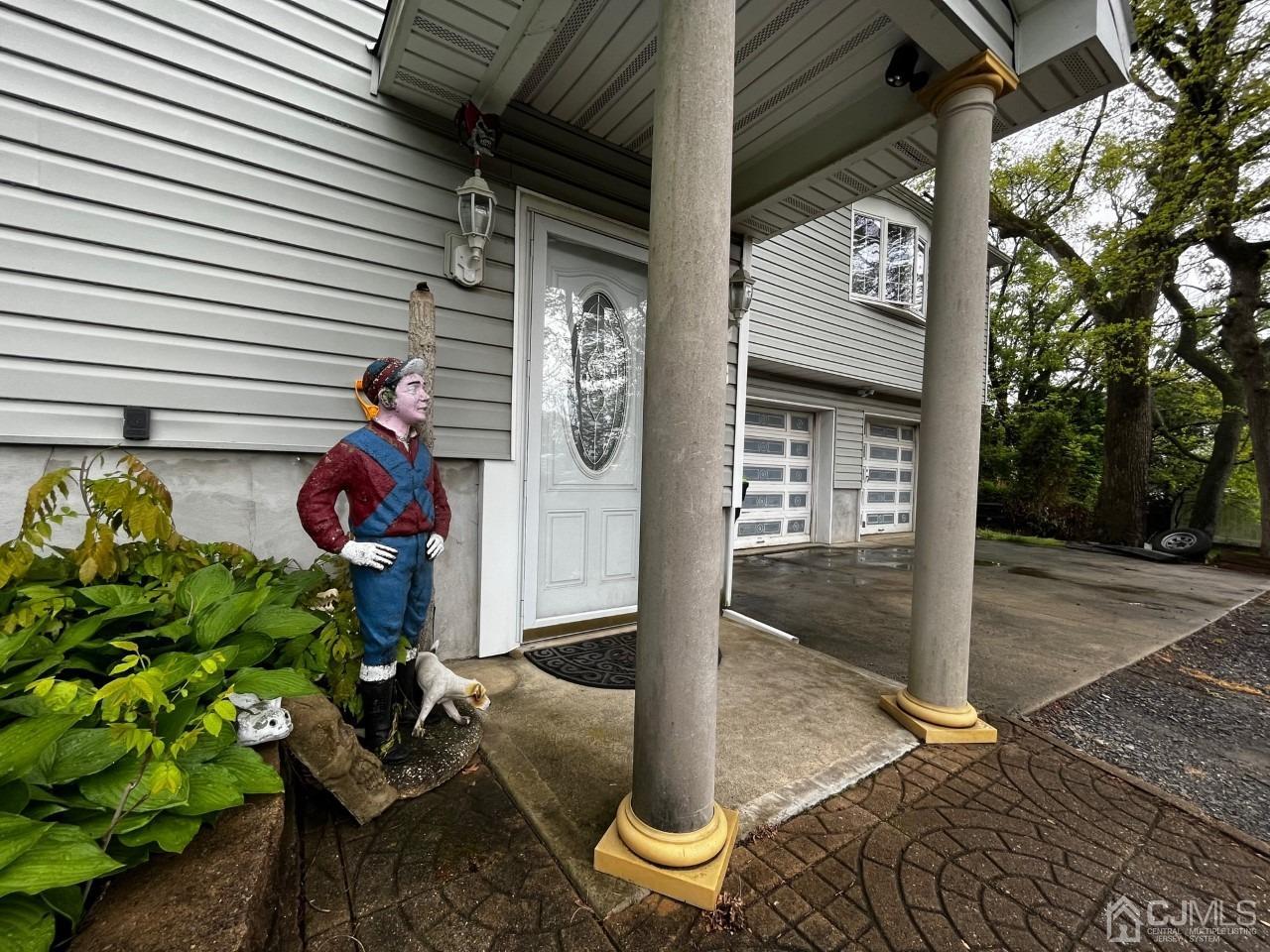 180 Amboy Road Old Bridge, NJ 07747 - Photo 27 of 29 a front view of a house with patio