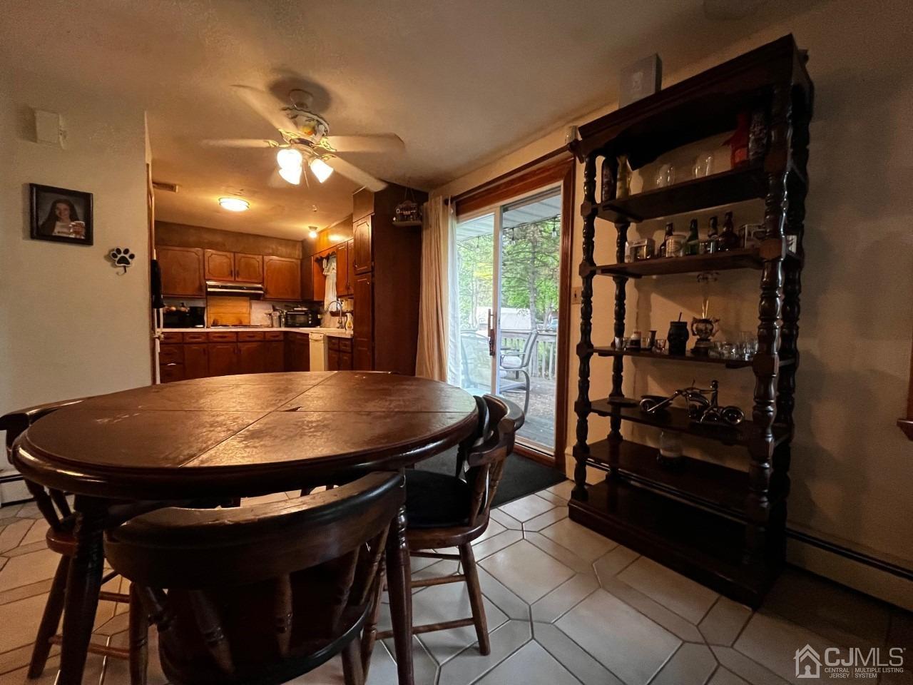180 Amboy Road Old Bridge, NJ 07747 - Photo 8 of 29 a dining room with furniture and window