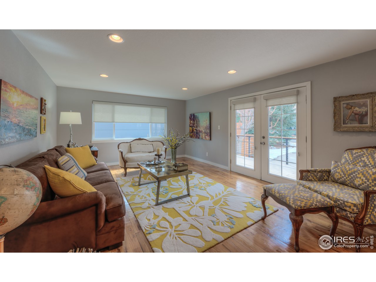 340 18th Street Boulder, CO 80302 - Photo 14 of 40 Upper level Living Room with Flatirons views - French doors lead to deck.