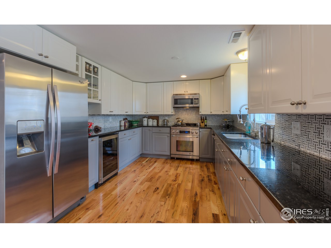 340 18th Street Boulder, CO 80302 - Photo 8 of 40 Updated kitchen with wine fridge