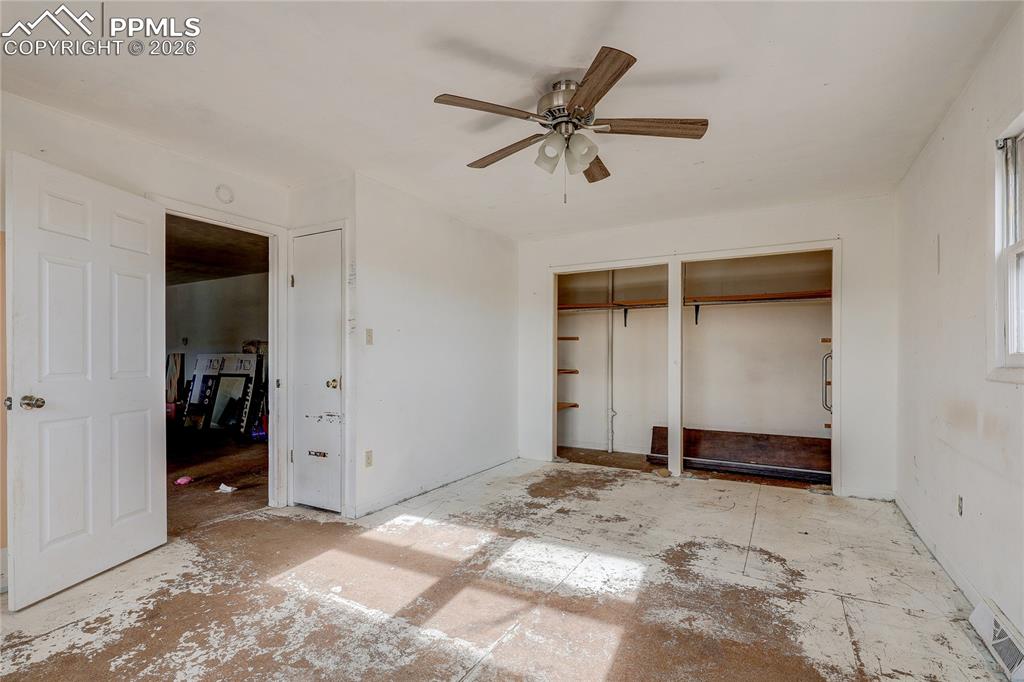 952 Twin Lakes Road Walsenburg, CO 81089 - Photo 16 of 34 a view of a livingroom with a ceiling fan