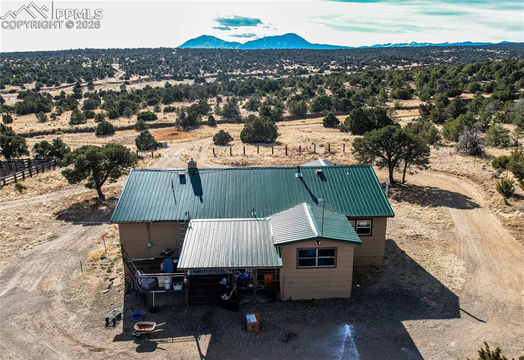 952 Twin Lakes Road Walsenburg, CO 81089 - Photo 4 of 34 an aerial view of a house with sitting space