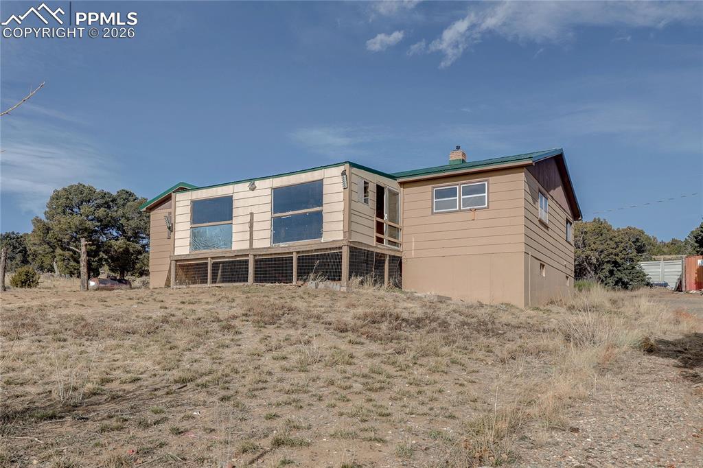 952 Twin Lakes Road Walsenburg, CO 81089 - Photo 6 of 34 a front view of a house with a yard