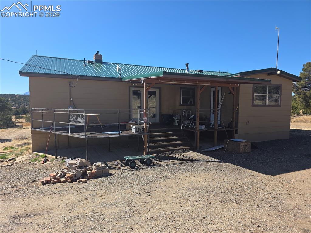 952 Twin Lakes Road Walsenburg, CO 81089 - Photo 7 of 34 a view of a house with a yard