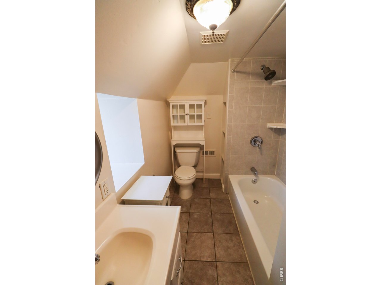 608 South Howes Street Fort Collins, CO 80521 - Photo 17 of 28 a bathroom with a toilet and a shower