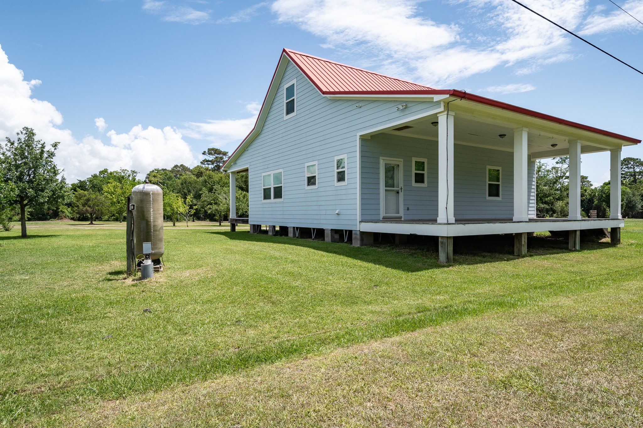 14328 Fm 2354 Rd Beach Baytown, TX 77523 - Photo 20 of 47 a view of a house with backyard