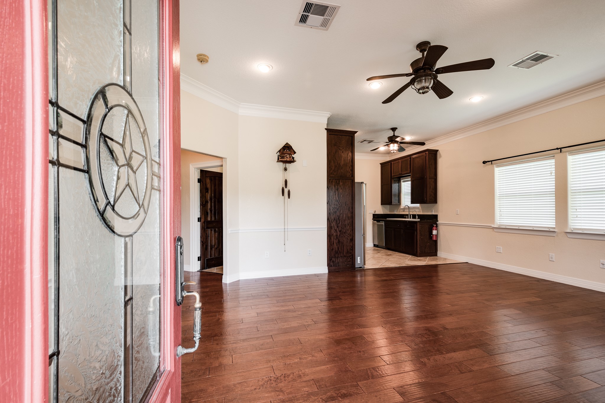 14328 Fm 2354 Rd Beach Baytown, TX 77523 - Photo 25 of 47 a view of a hallway with wooden floor and stainless steel appliances