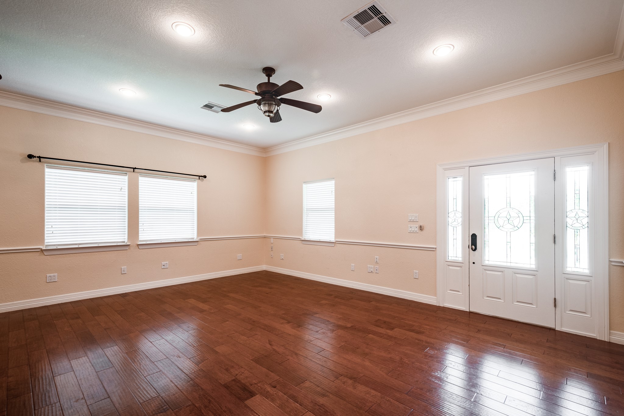 14328 Fm 2354 Rd Beach Baytown, TX 77523 - Photo 28 of 47 a view of empty room with wooden floor and fan