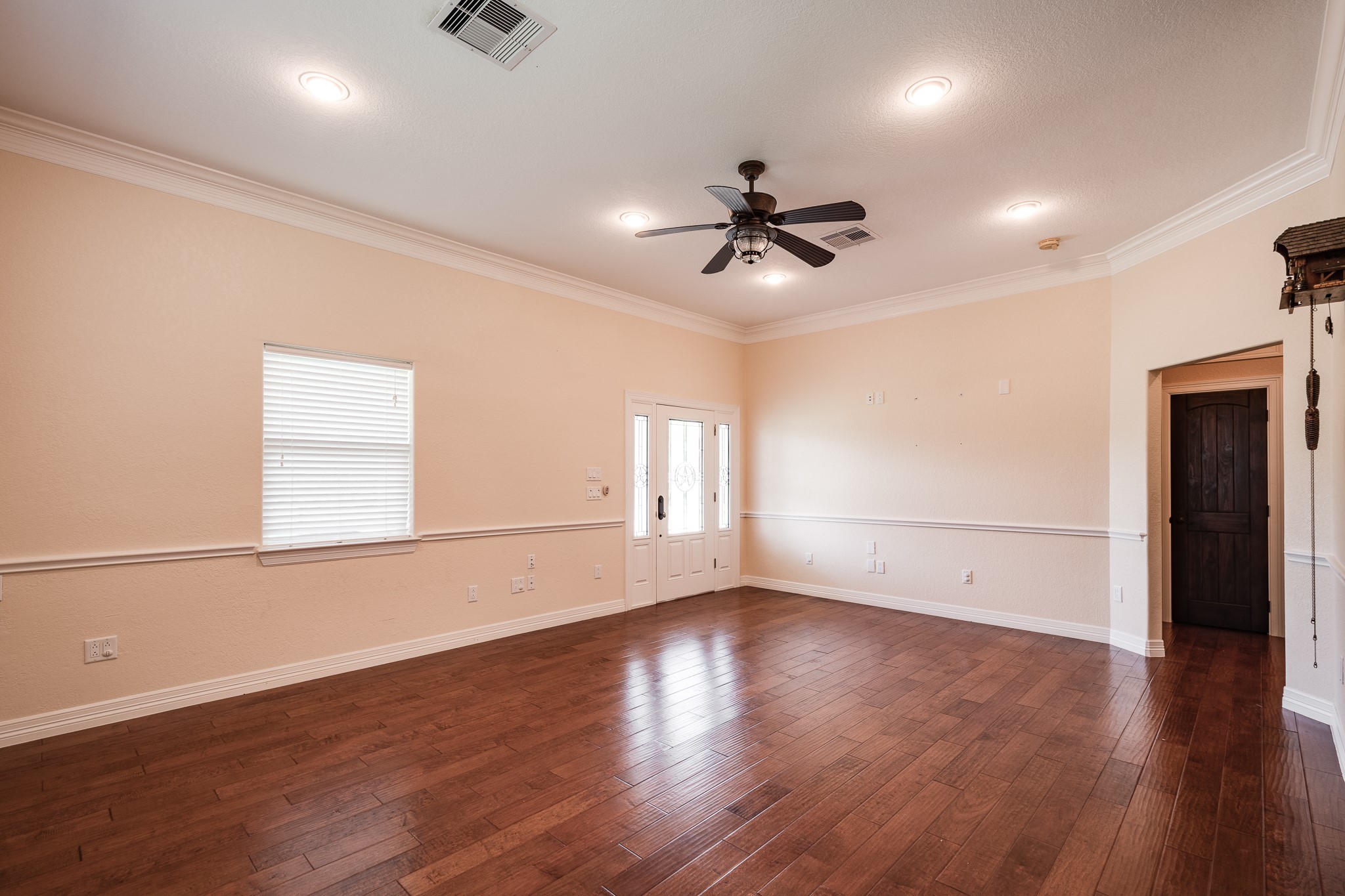 14328 Fm 2354 Rd Beach Baytown, TX 77523 - Photo 29 of 47 a view of empty room with wooden floor and fan
