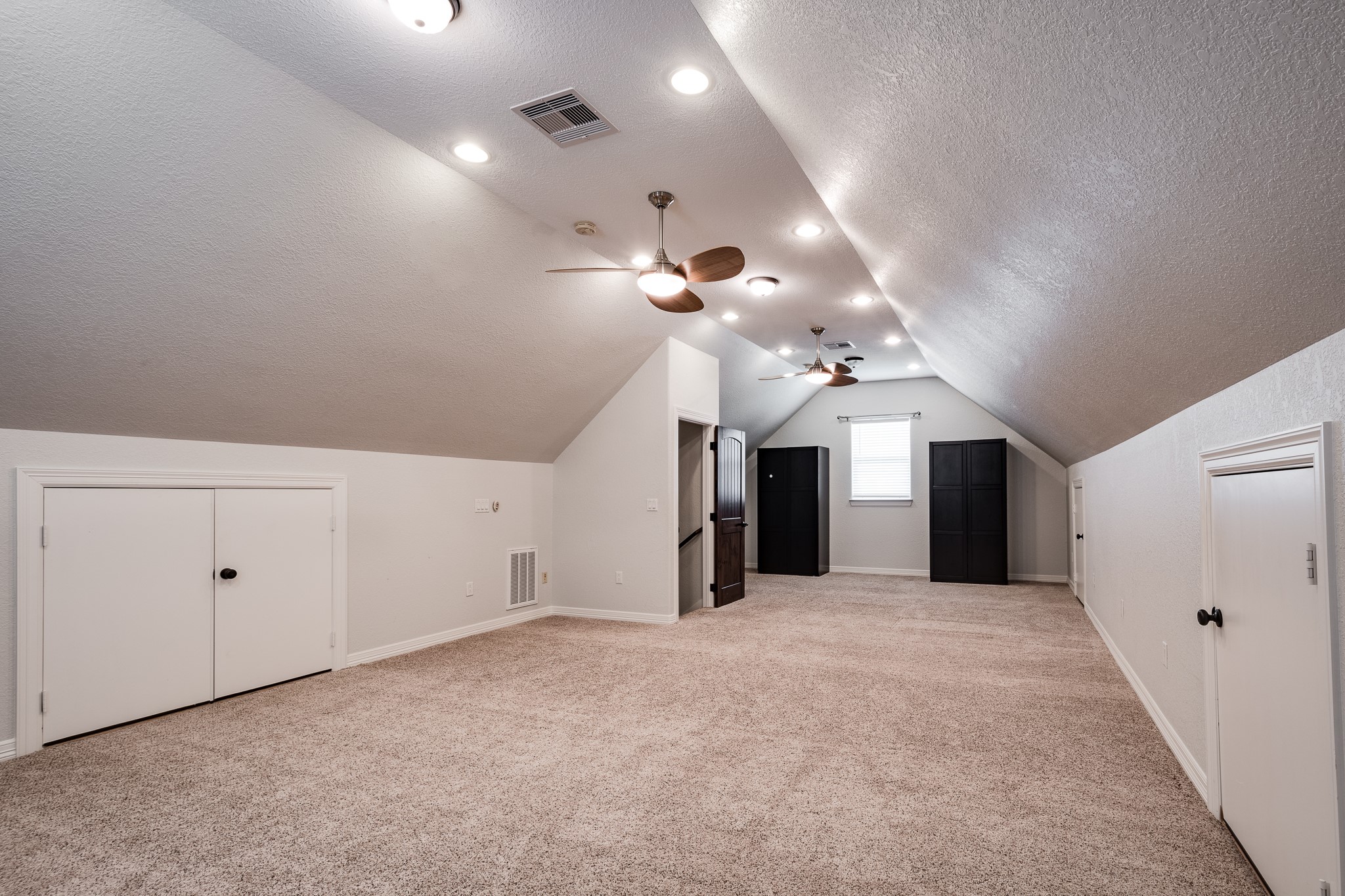 14328 Fm 2354 Rd Beach Baytown, TX 77523 - Photo 42 of 47 wooden floor in an empty room with a ceiling fan