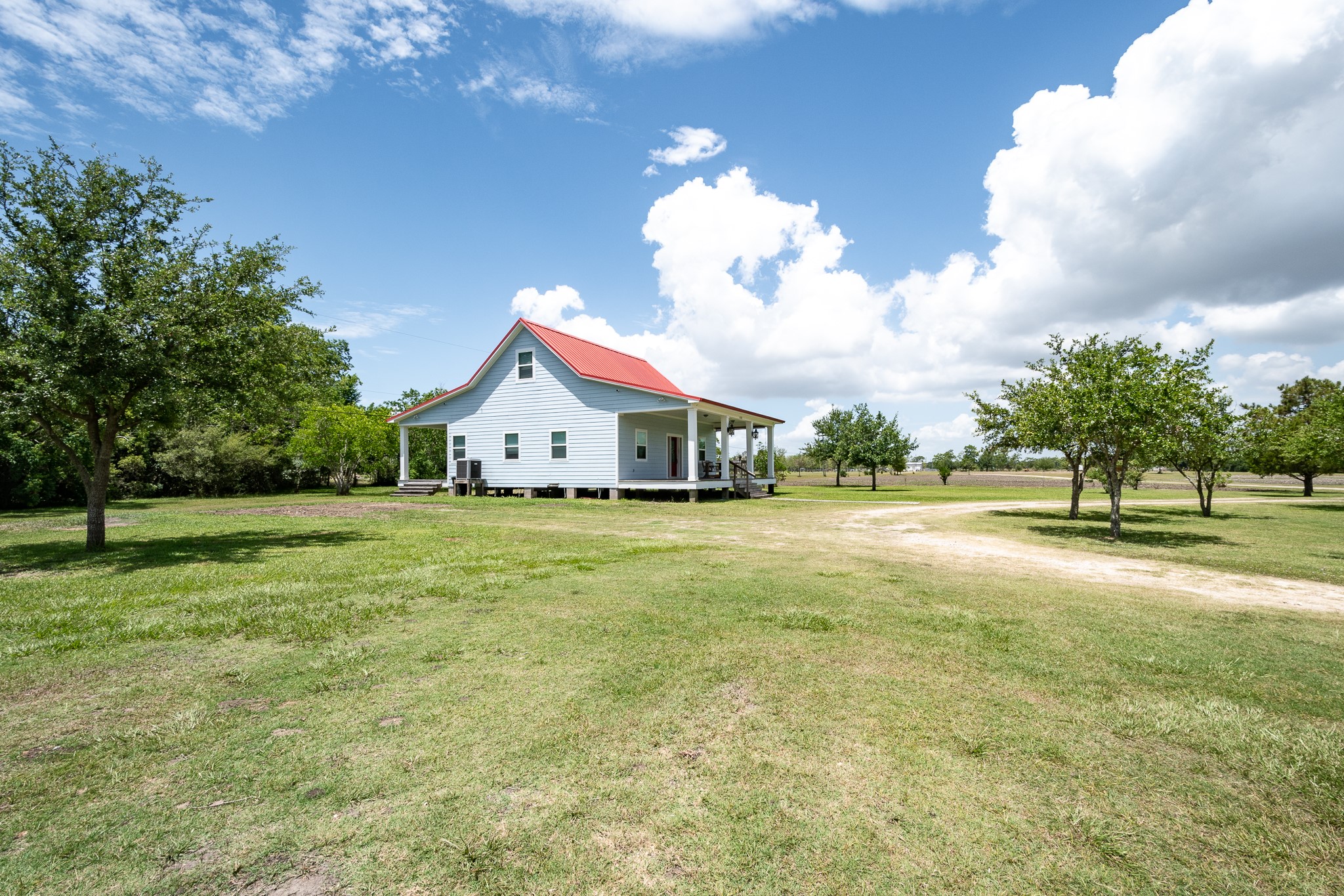 14328 Fm 2354 Rd Beach Baytown, TX 77523 - Photo 45 of 47 a view of a house with a yard