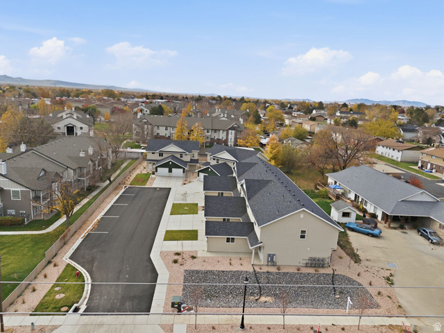 1615 North Angel Street, Unit E Layton, UT 84041 - Photo 39 of 42 Aerial perspective of suburban area with a mountain backdrop