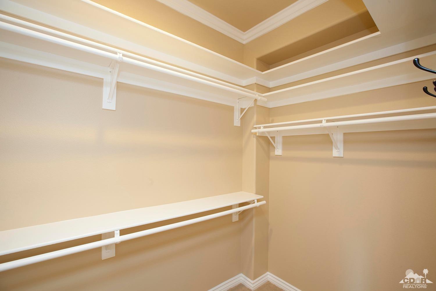 79338 Cool Reflection La Quinta, CA 92253 - Photo 15 of 16 a view of a room with racks on the wall