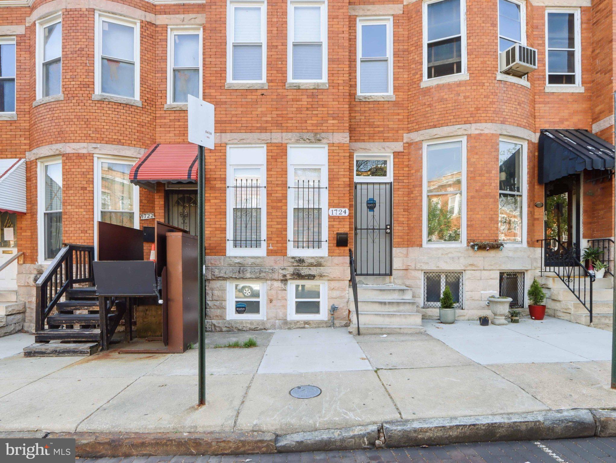 1724 North Payson Street Baltimore, MD 21217 - Photo 2 of 41 Charming brick facade in vibrant locale.