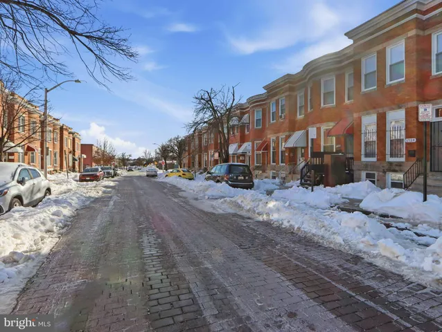 a view of a street with cars