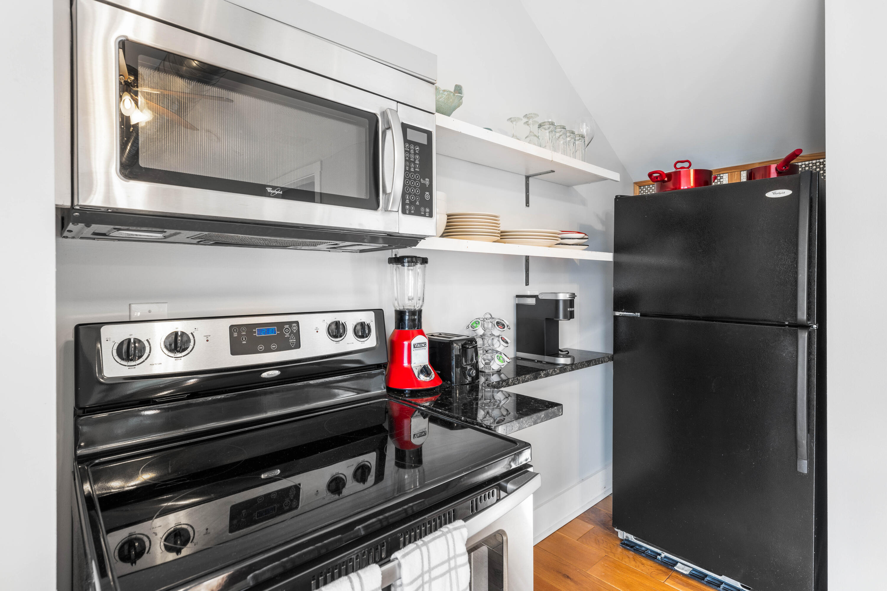 184 Crescent Road Santa Rosa Beach, FL 32459 - Photo 54 of 61 a kitchen with a refrigerator and a stove