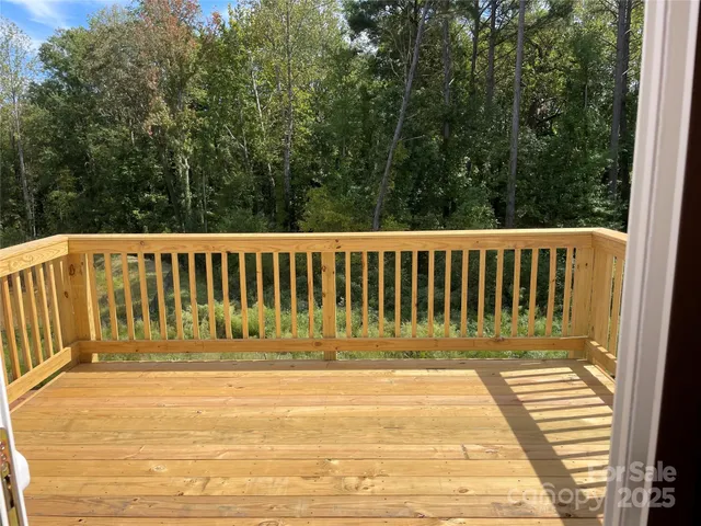 a view of deck with a yard