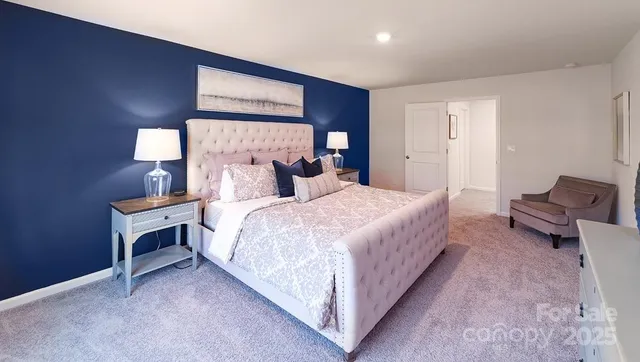 a bathroom with a tub sink double vanity granite tub and shower