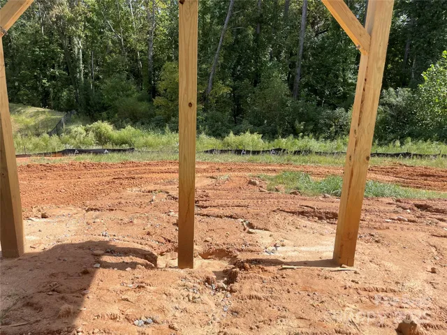 a view of a backyard of the house
