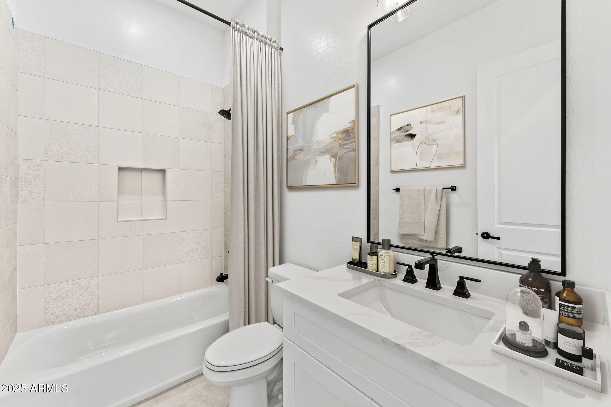 17083 East Dl Lane Rio Verde, AZ 85263 - Photo 16 of 22 a bathroom with a bathtub shower sink mirror vanity and toilet