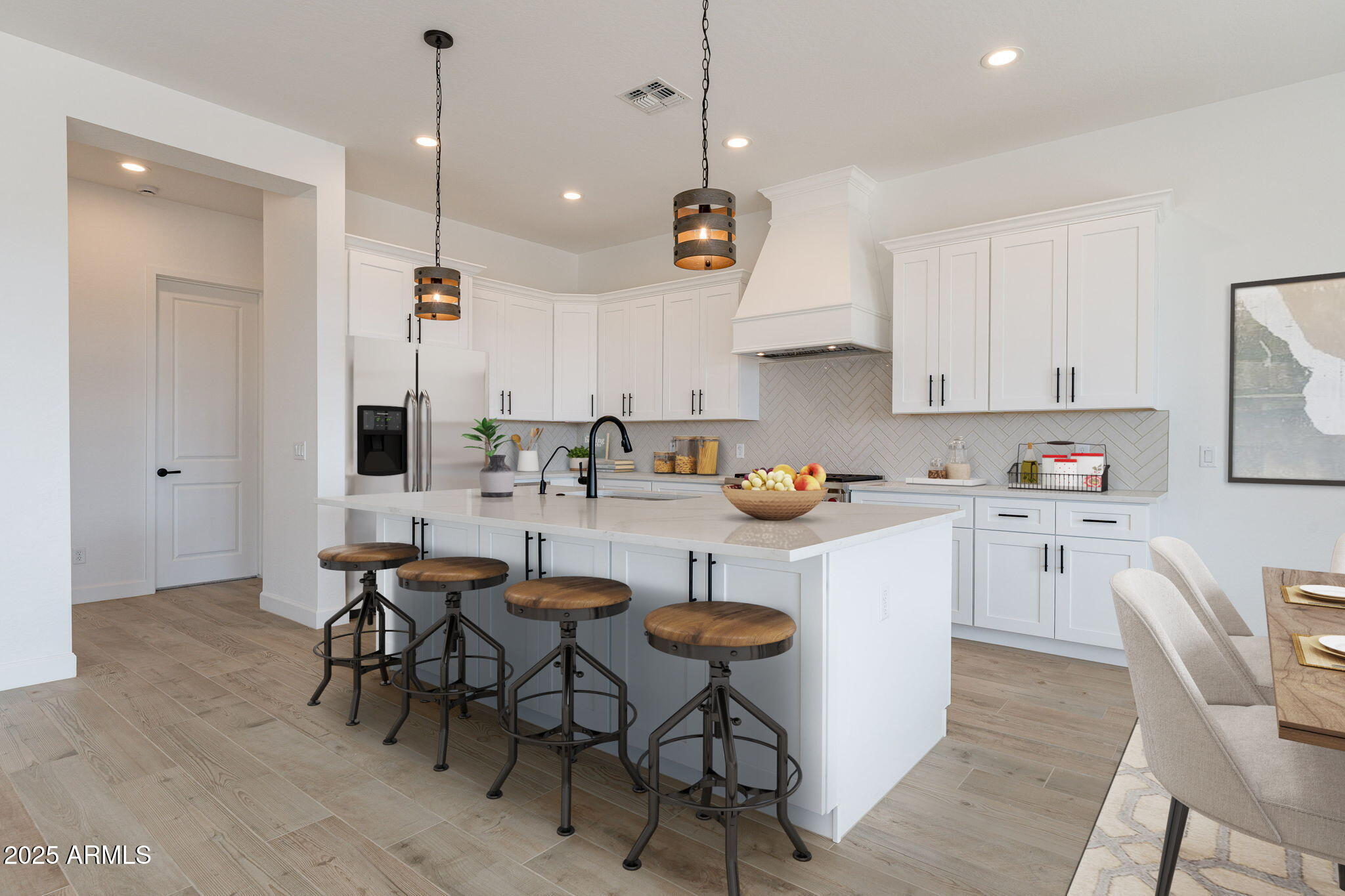 17083 East Dl Lane Rio Verde, AZ 85263 - Photo 2 of 22 a kitchen with white cabinets and chairs