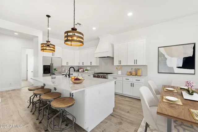 a view of kitchen with cabinets and wooden floor