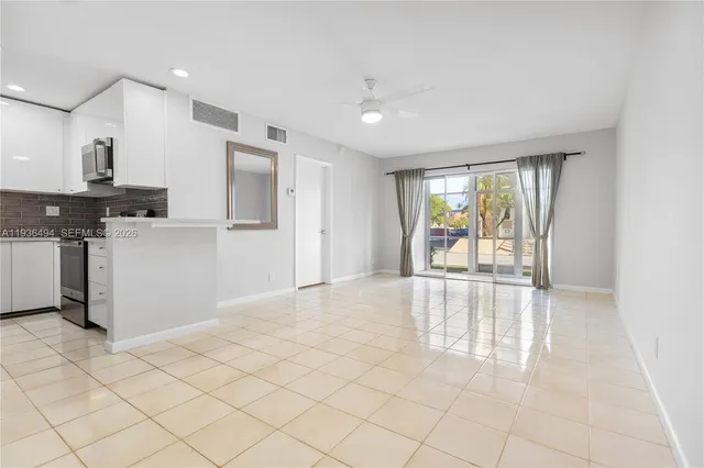 a view of a kitchen with a sink