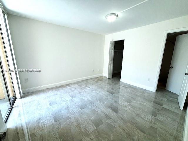 10801 Southwest 109th Court, Unit D103 Miami, FL 33176 - Photo 6 of 12 a view of an empty room