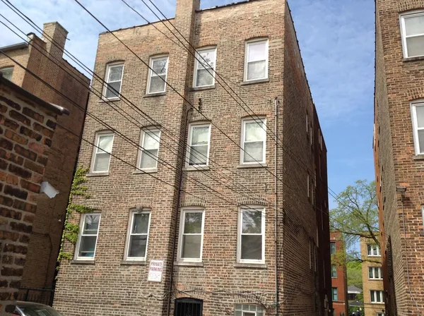 a front view of a multi story residential apartment building