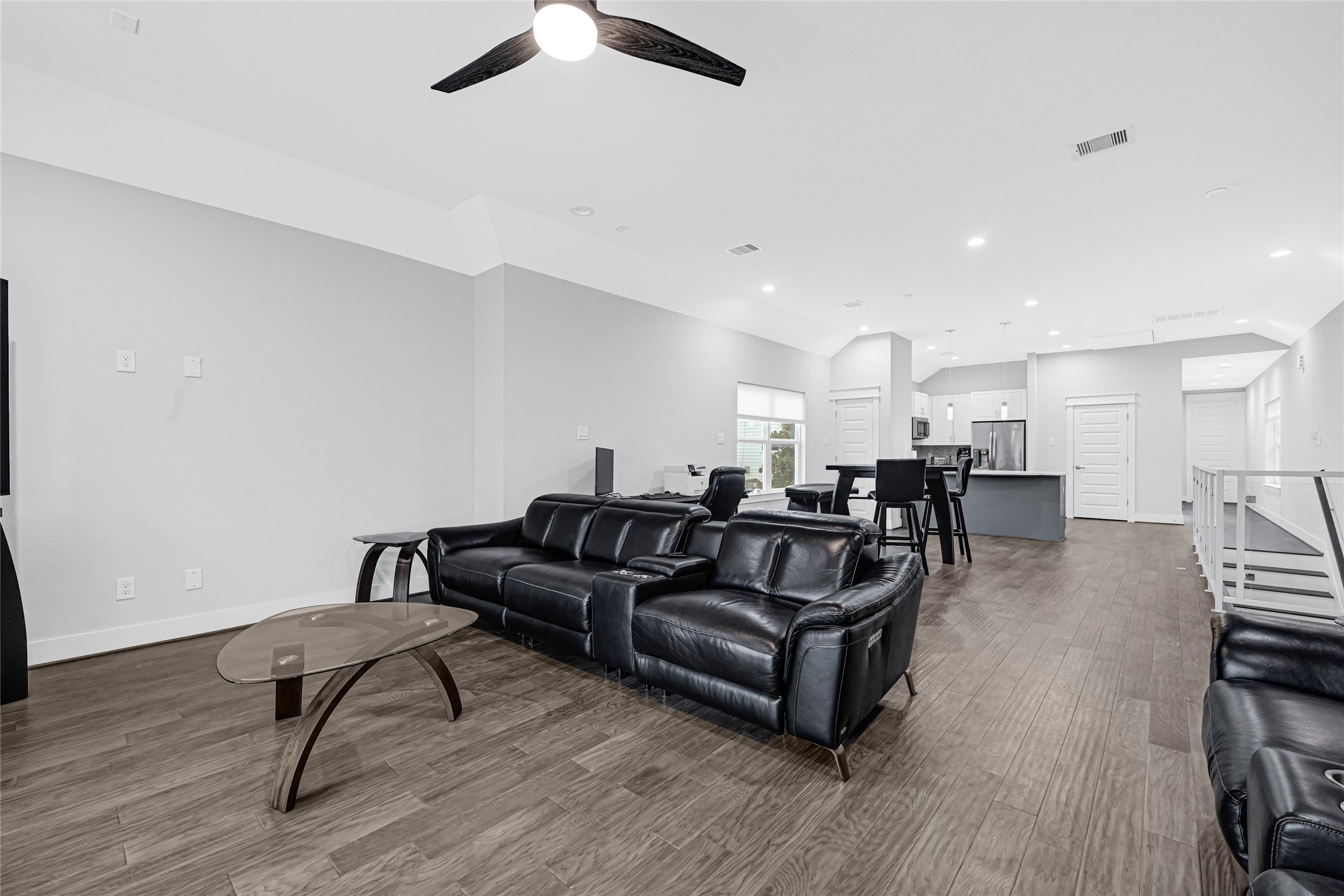 6118 Truro Street Houston, TX 77007 - Photo 14 of 39 a living room with furniture and a wooden floor