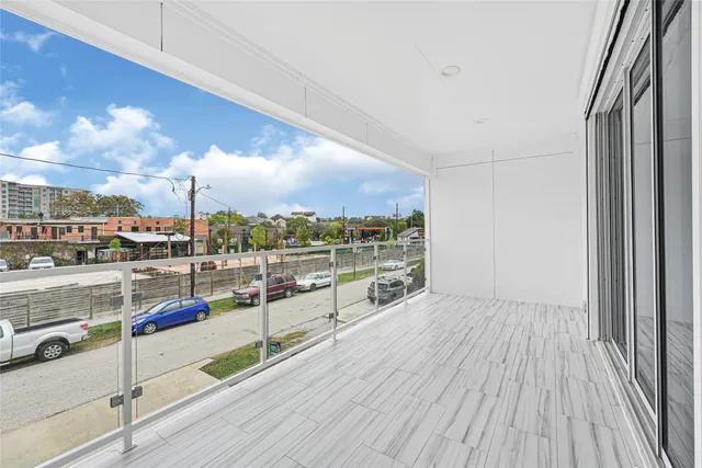 a view of backyard and deck