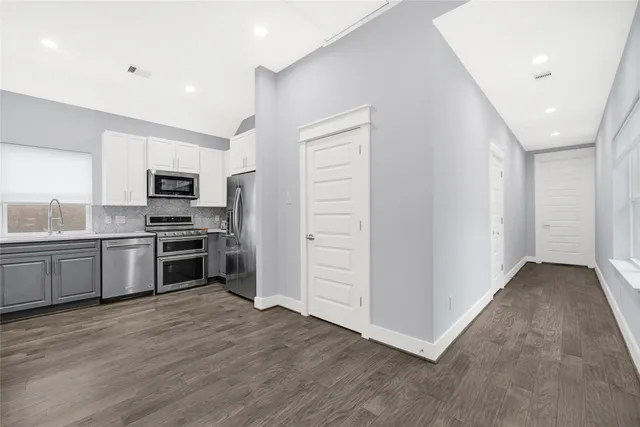 a bedroom with a bed and furniture