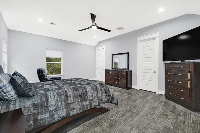 a bathroom with a sink a mirror and a shower