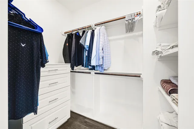 a kitchen with sink cabinets and stainless steel appliances