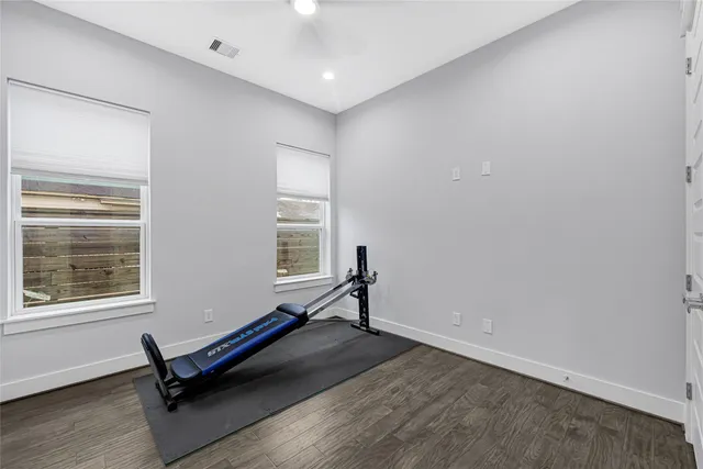 a bathroom with a sink a mirror and a vanity