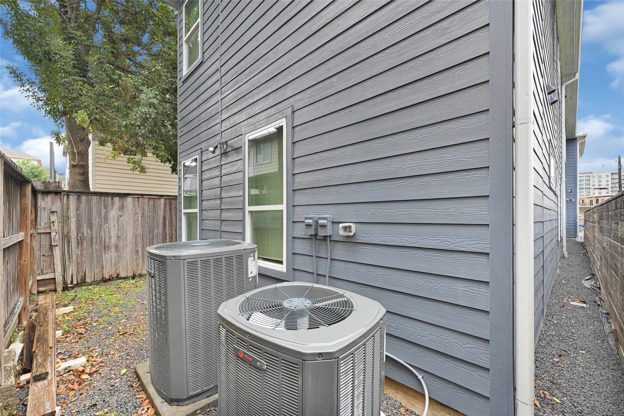6118 Truro Street Houston, TX 77007 - Photo 37 of 39 a backyard of a house with fire pit and furniture