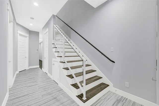 a view of entryway with wooden floor