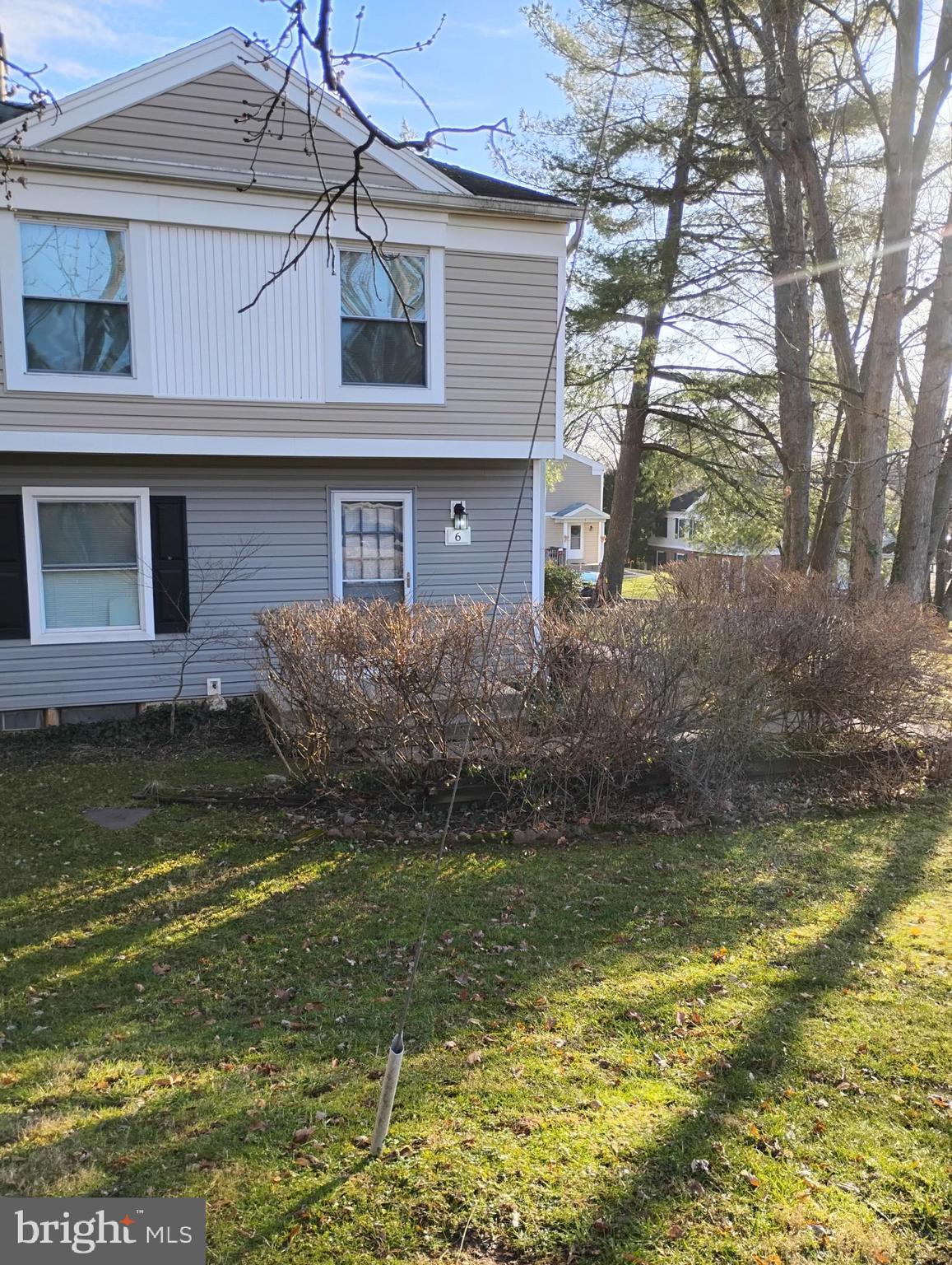 6 Ridgelawn Road, Unit C Reisterstown, MD 21136 - Photo 1 of 28 a front view of a house with a yard