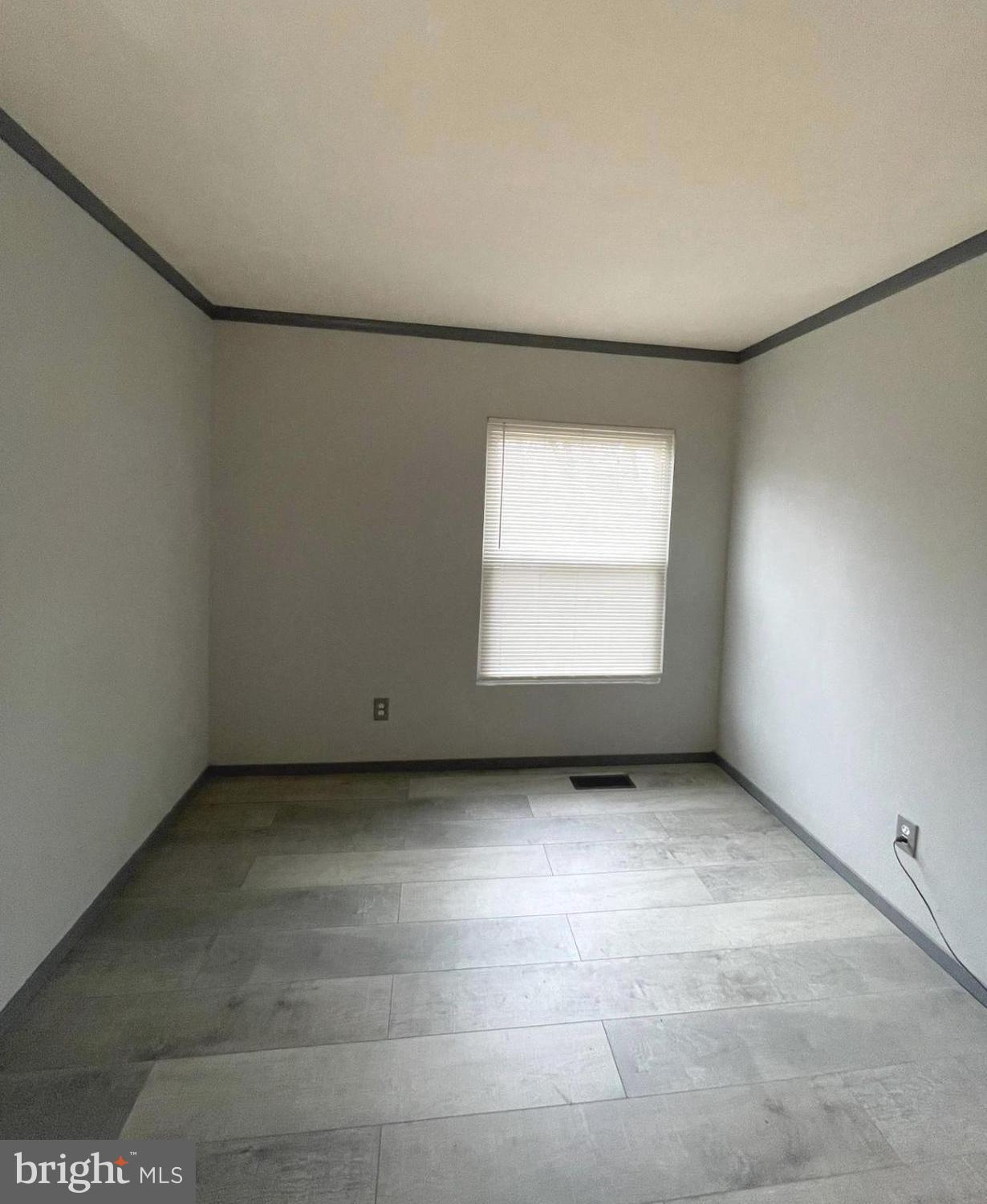6 Ridgelawn Road, Unit C Reisterstown, MD 21136 - Photo 17 of 28 an empty room with a window