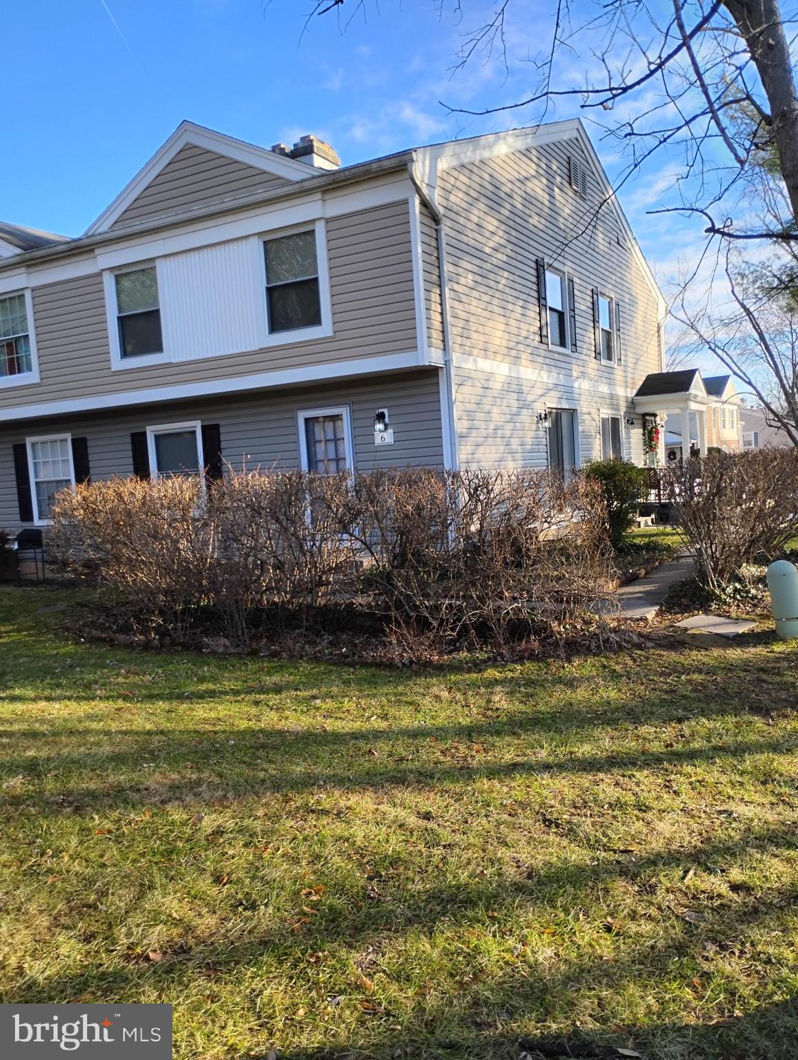 6 Ridgelawn Road, Unit C Reisterstown, MD 21136 - Photo 2 of 28 a front view of a house with swimming pool