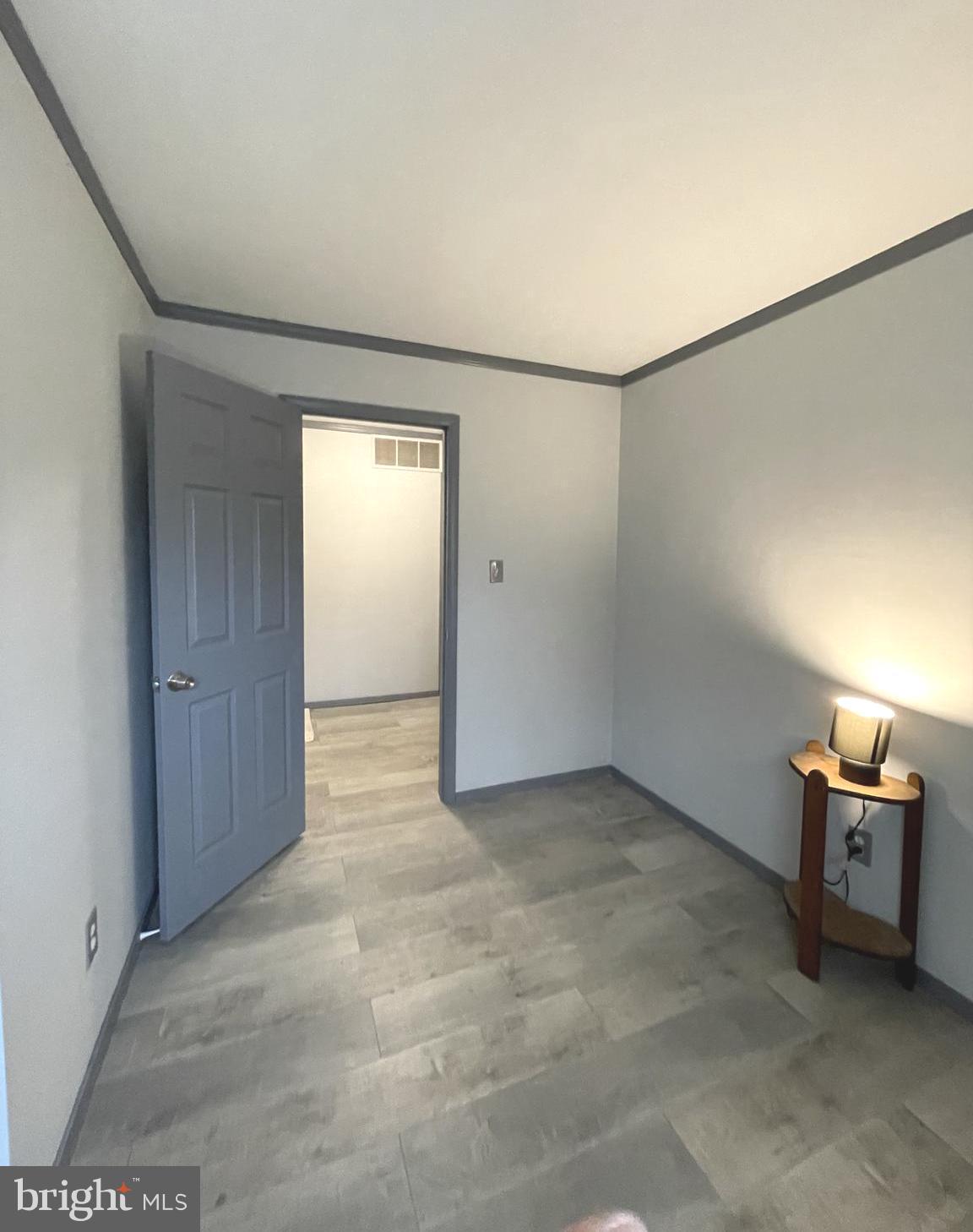 6 Ridgelawn Road, Unit C Reisterstown, MD 21136 - Photo 23 of 28 an empty room with windows