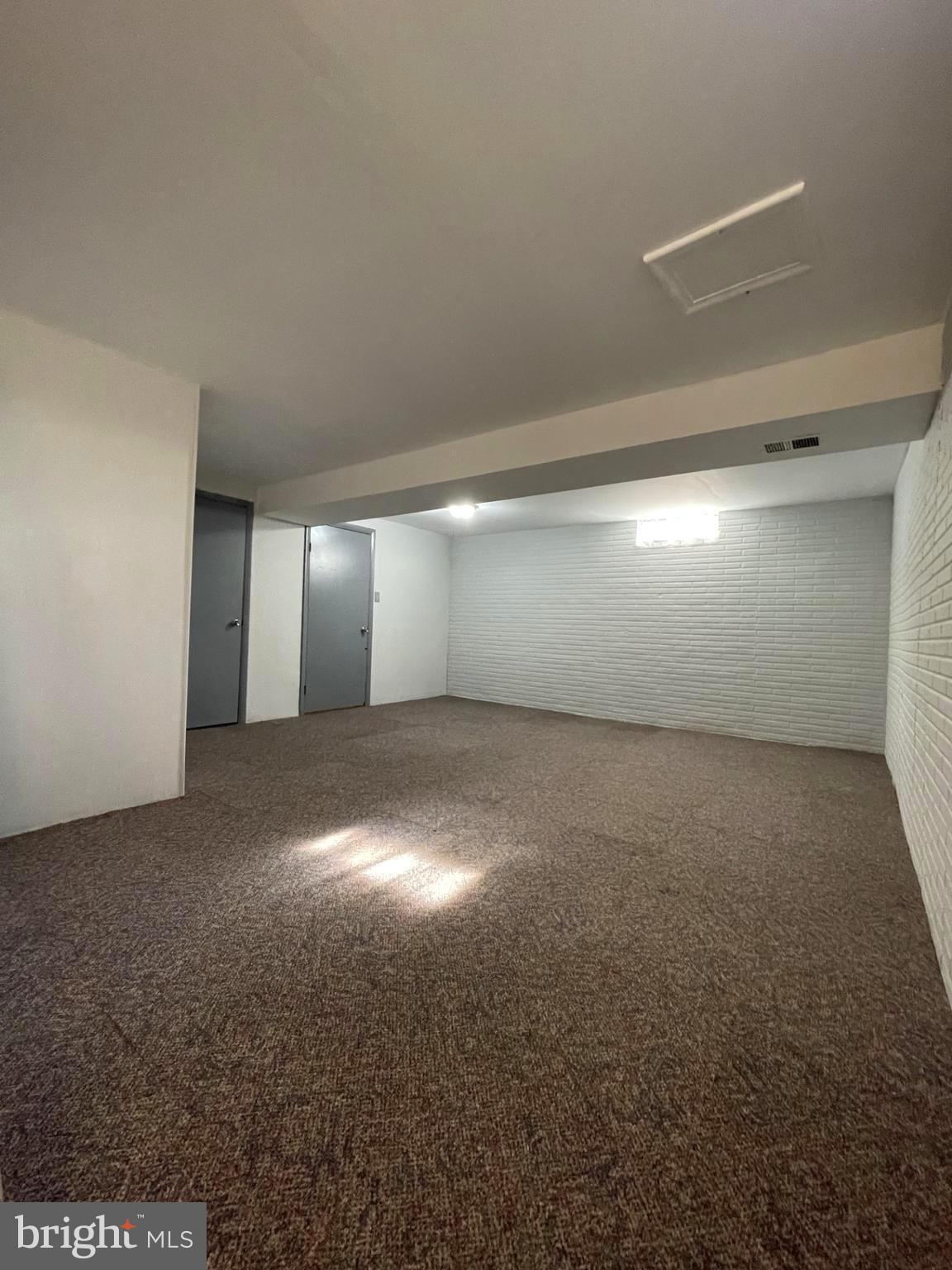 6 Ridgelawn Road, Unit C Reisterstown, MD 21136 - Photo 26 of 28 a view of an empty room with a window
